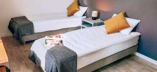 Хостелы Apartamenty przy SUNTAGO Мщонув Улучшенный двухместный номер с 1 кроватью или 2 отдельными кроватями и видом на сад-2